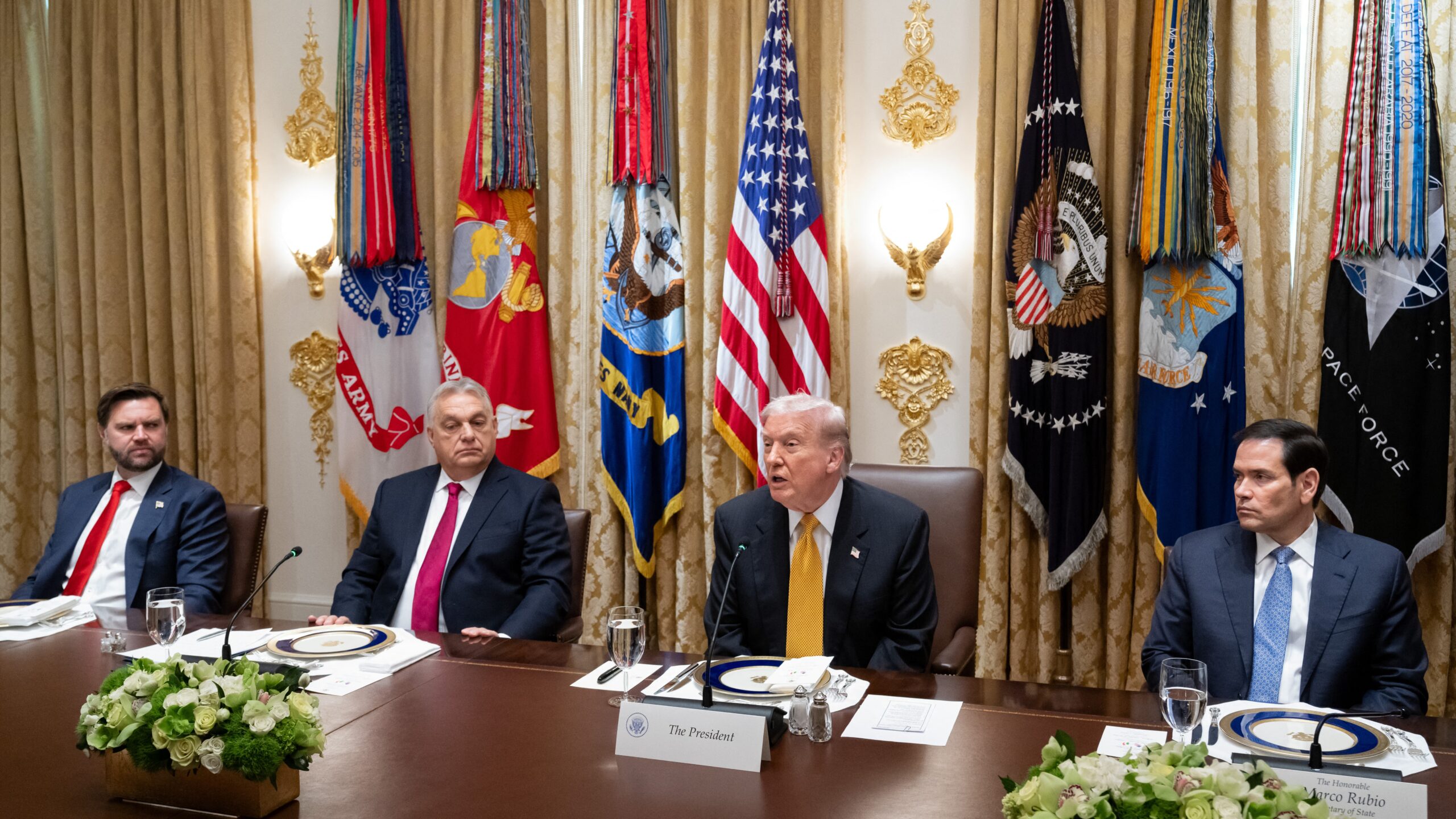 S President Donald Trump, alongside Secretary of State Marco Rubio (R) and Vice President JD Vance (L), speaks during a meeting with Hungarian Prime Minister Viktor Orban (2L) in the Cabinet Room of the White House in Washington, DC on November 7, 2025.